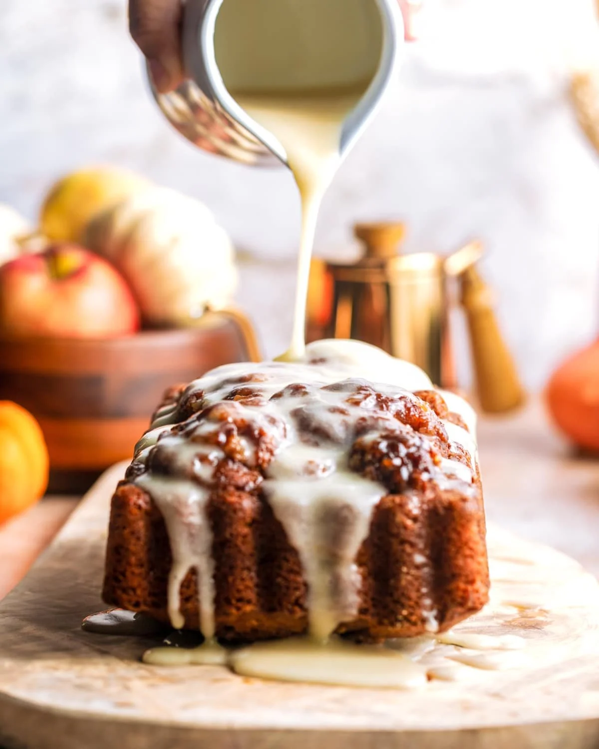 Loaf of Heritage Apple Fritter Bread with slices showing soft texture and apple chunks